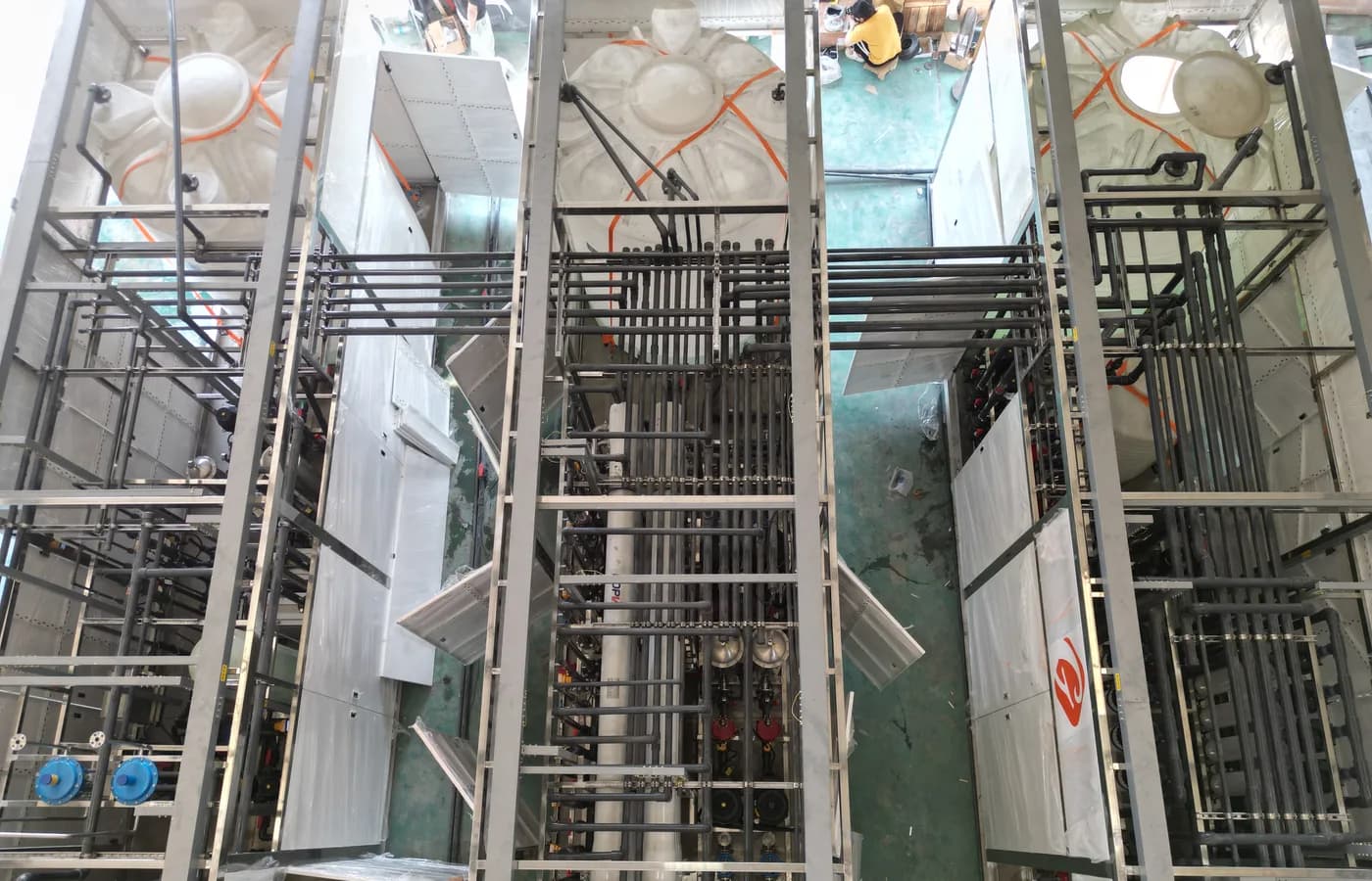 Industrial water treatment piping and process equipment under assembly