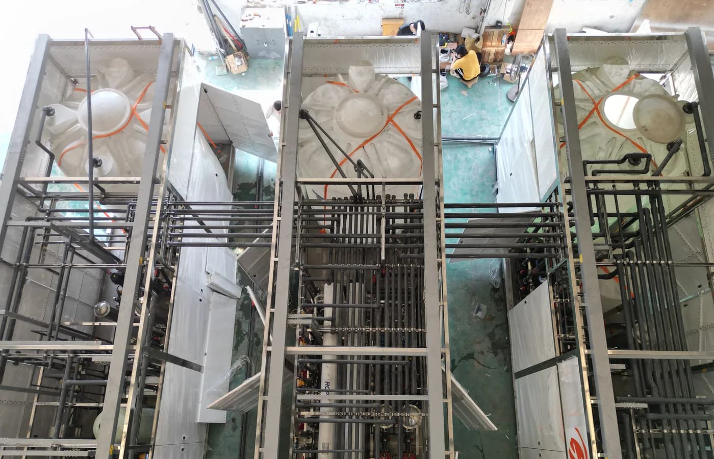 Industrial reverse osmosis treatment train under factory assembly