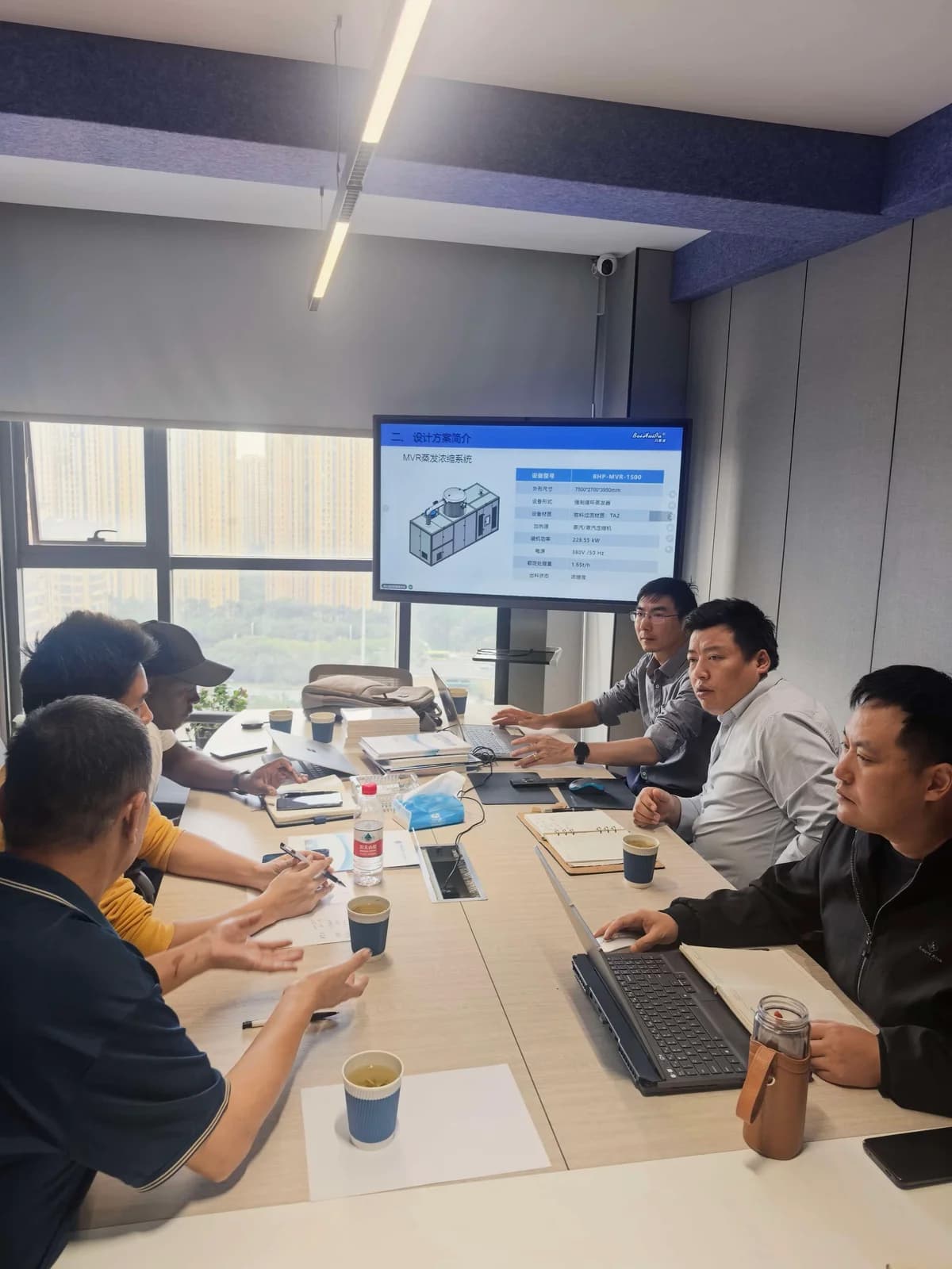 Technical session at the BHP Jiangsu branch with the Kenyan customer and the MVR system design scheme on screen